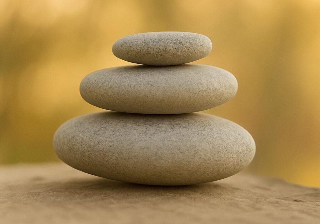 Balanced stones in warm light